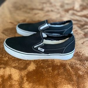 Black slip-on Vans